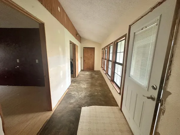 wooden floor with a rug