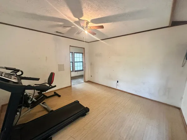 a view of a workspace with furniture