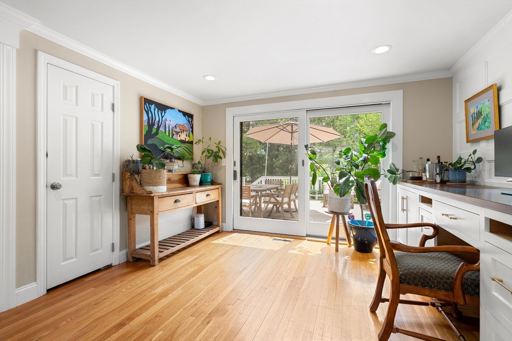35 Spallus Road Stoughton, MA 02072 - Photo 10 of 39 a dining room with furniture and a floor to ceiling window