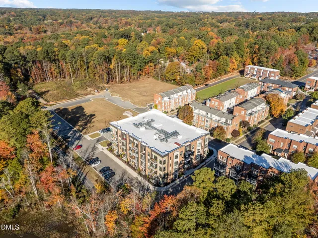 a view of kitchen with cabinets and wooden floor