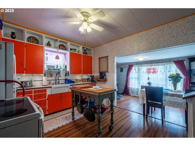a room with furniture pool table and flat screen tv