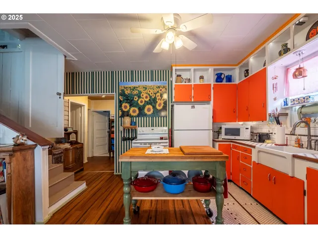 a room with furniture and pool table