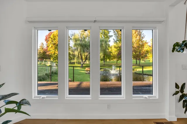 a kitchen with stainless steel appliances a sink stove and refrigerator