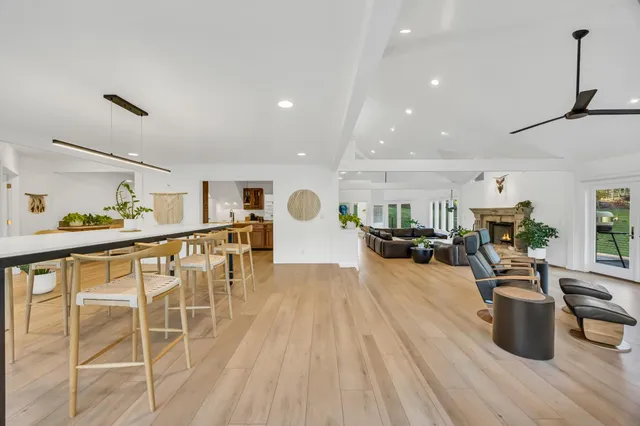 a bathroom with a double vanity sink and mirror