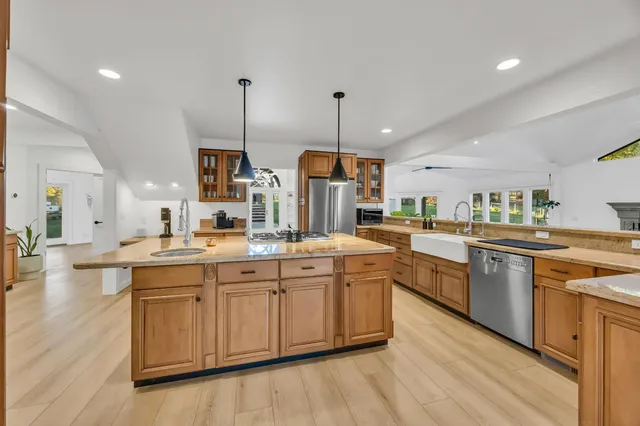 a en suite bathroom with a toilet sink and mirror