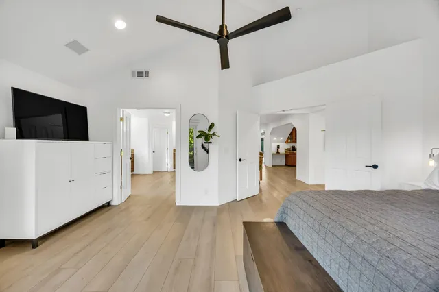 a bathroom with a sink a mirror and a shower curtain