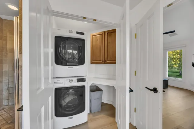a front view of a house with garden and porch