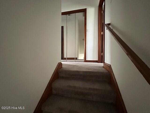 837 Simpson Ditch Road Elizabeth City, NC 27909 - Photo 14 of 26 Stairs to second floor. Showing large linen closet at top of stairs