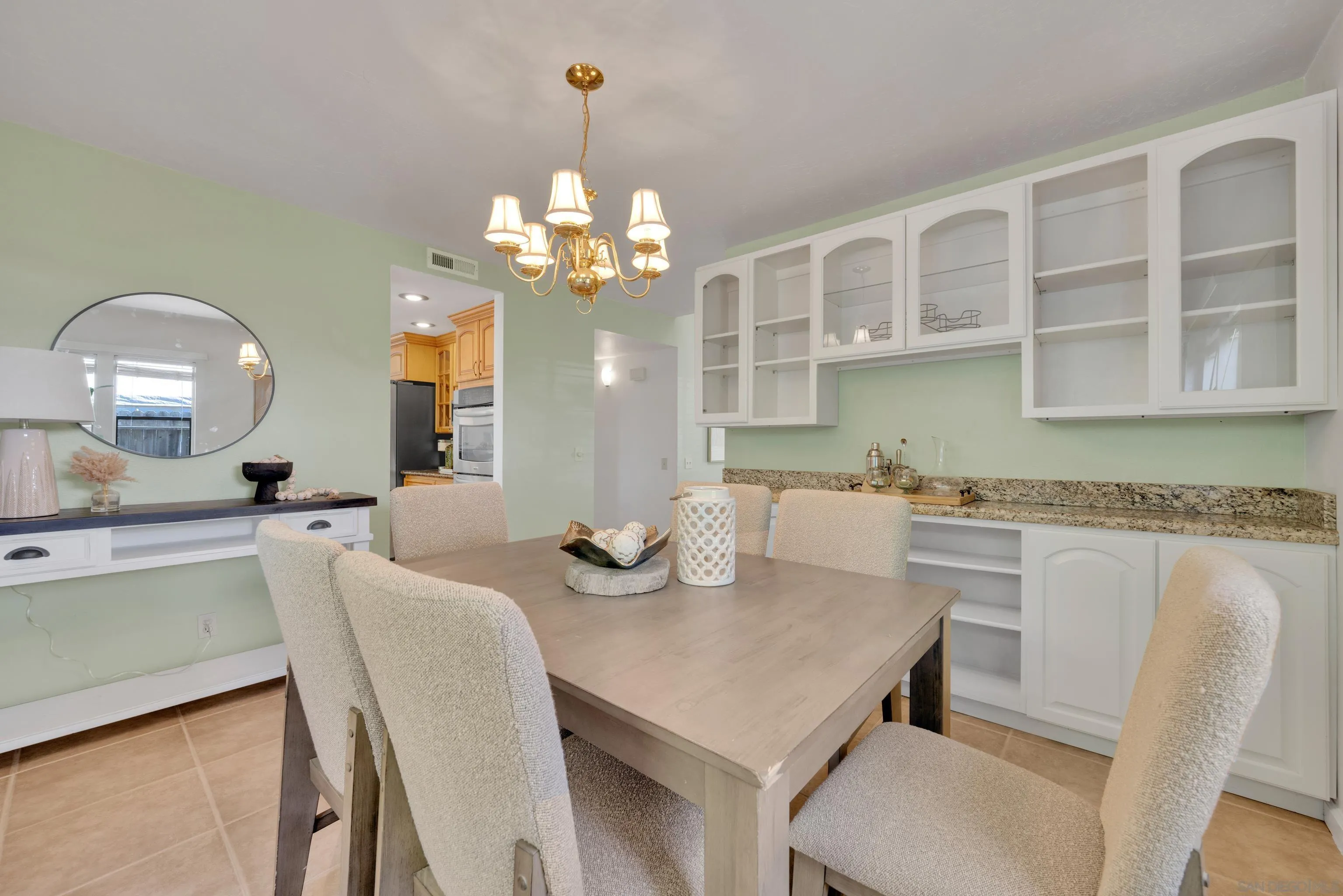 2010 Palsero Avenue Escondido, CA 92029 - Photo 12 of 58 a view of a dining room with furniture and chandelier