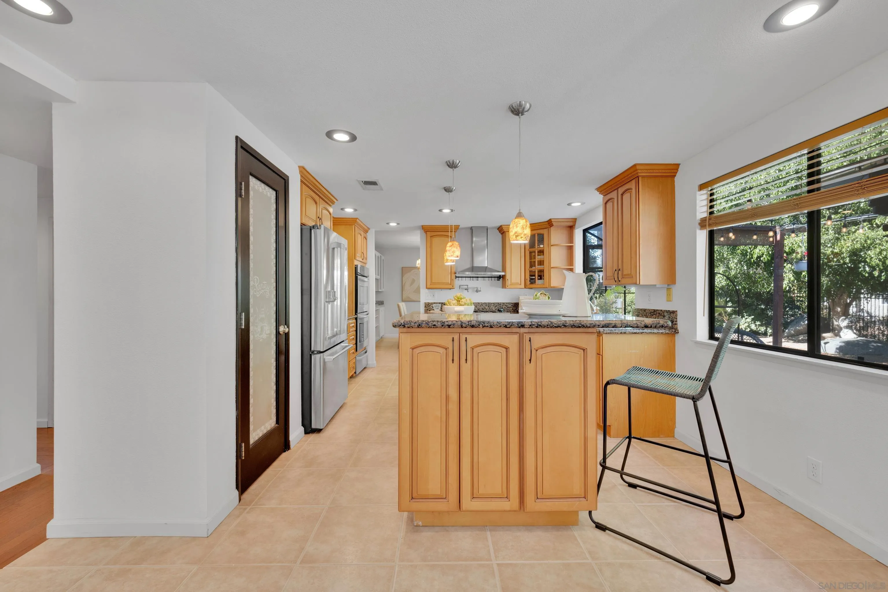 2010 Palsero Avenue Escondido, CA 92029 - Photo 18 of 58 a view of kitchen with furniture and refrigerator