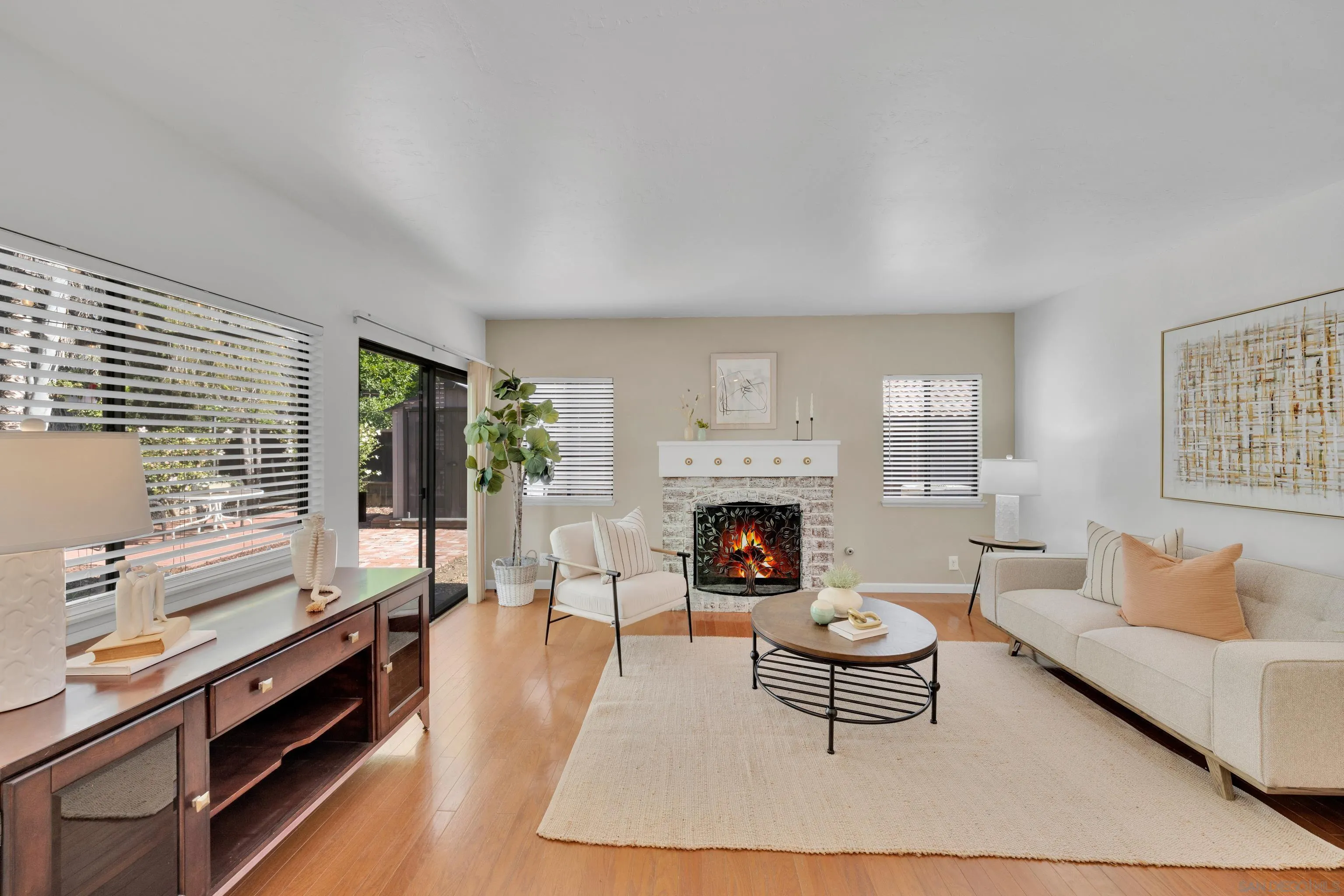 2010 Palsero Avenue Escondido, CA 92029 - Photo 20 of 58 a living room with furniture and a fireplace