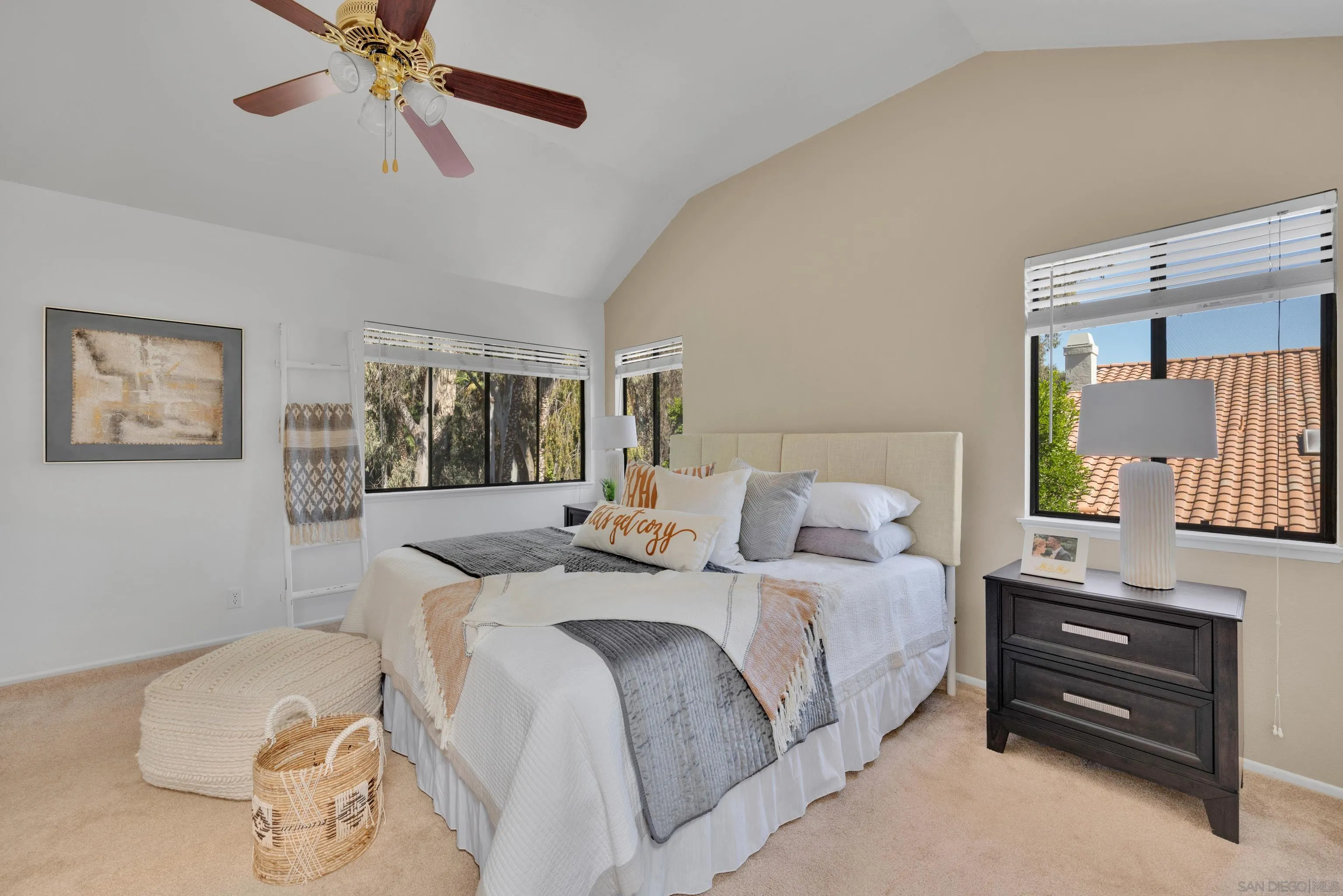 2010 Palsero Avenue Escondido, CA 92029 - Photo 30 of 58 a bedroom with a bed and a chandelier