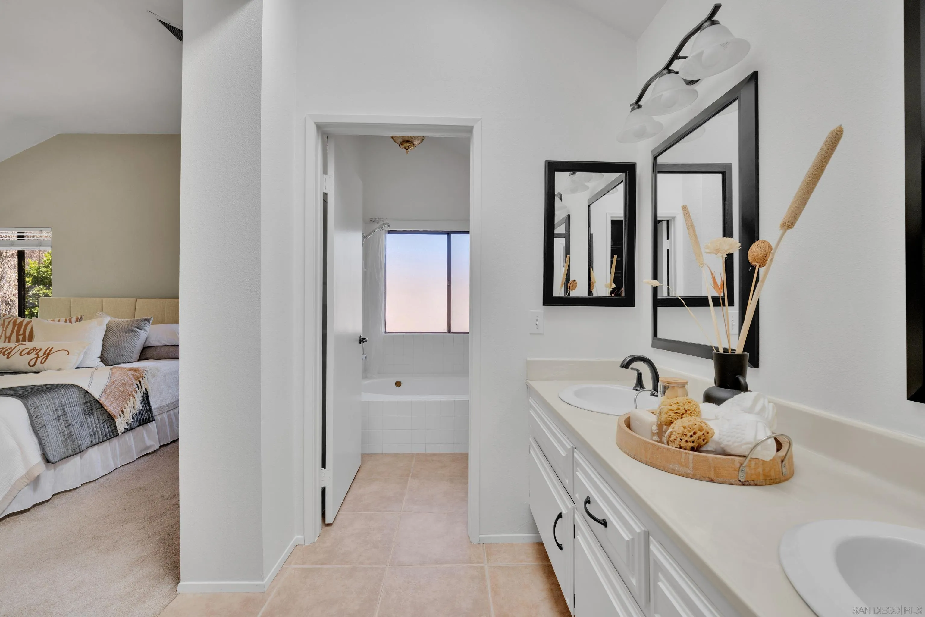 2010 Palsero Avenue Escondido, CA 92029 - Photo 34 of 58 a bathroom with a tub sink and mirror