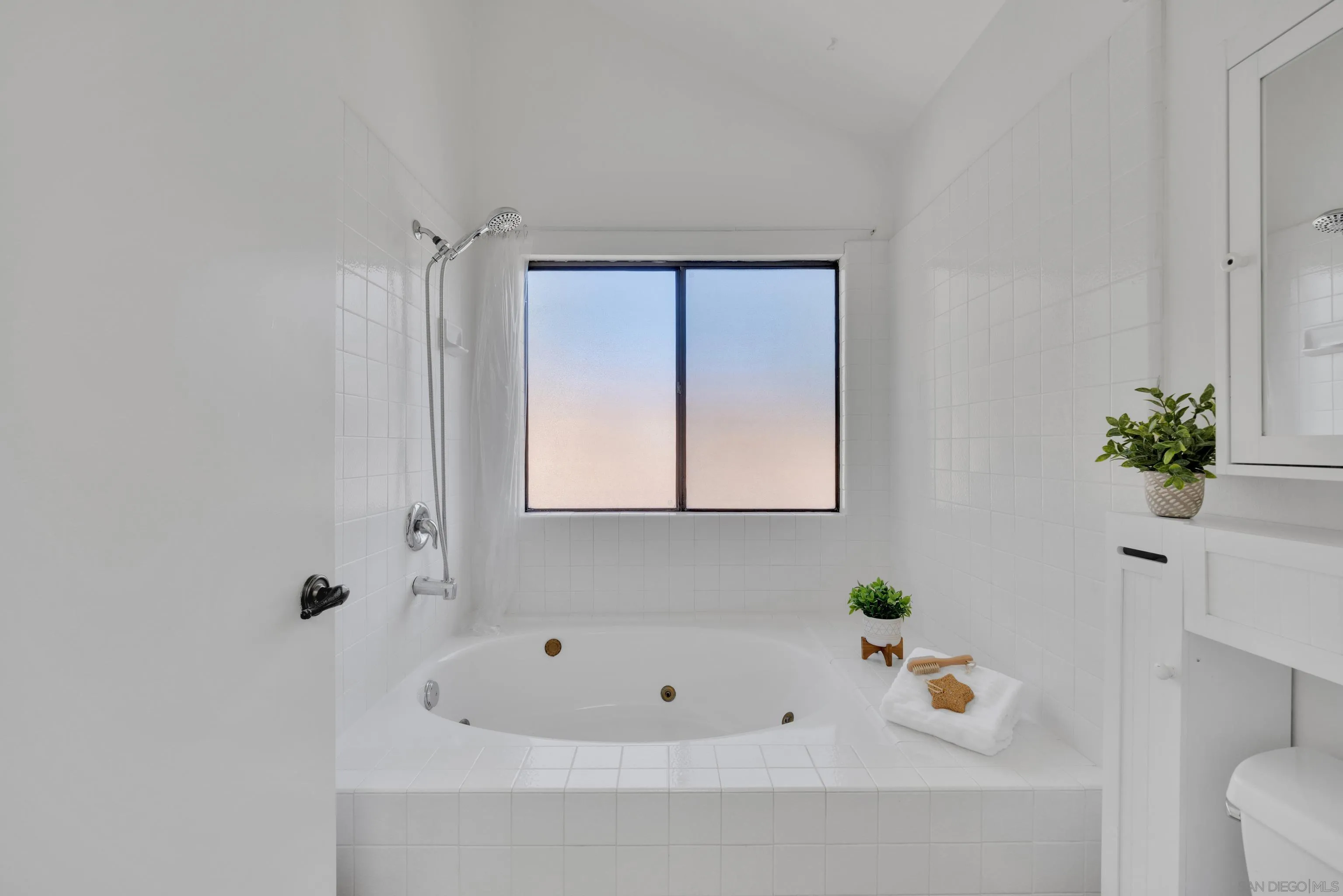 2010 Palsero Avenue Escondido, CA 92029 - Photo 35 of 58 a bathroom with a bathtub and shower