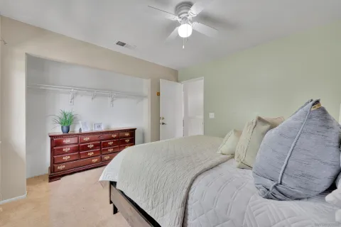 a view of a backyard with a patio and outdoor seating