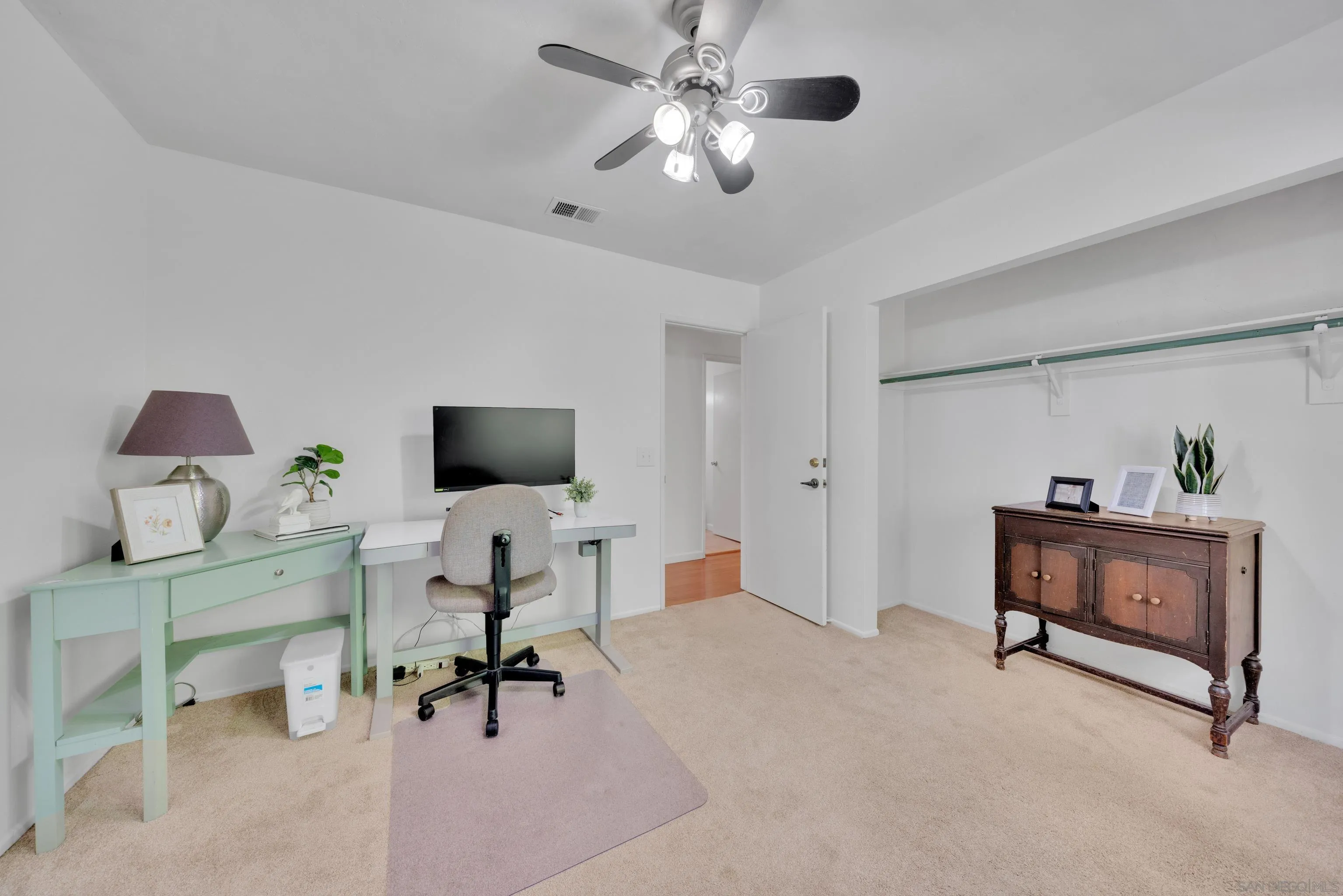 2010 Palsero Avenue Escondido, CA 92029 - Photo 41 of 58 a living room with furniture and a flat screen tv