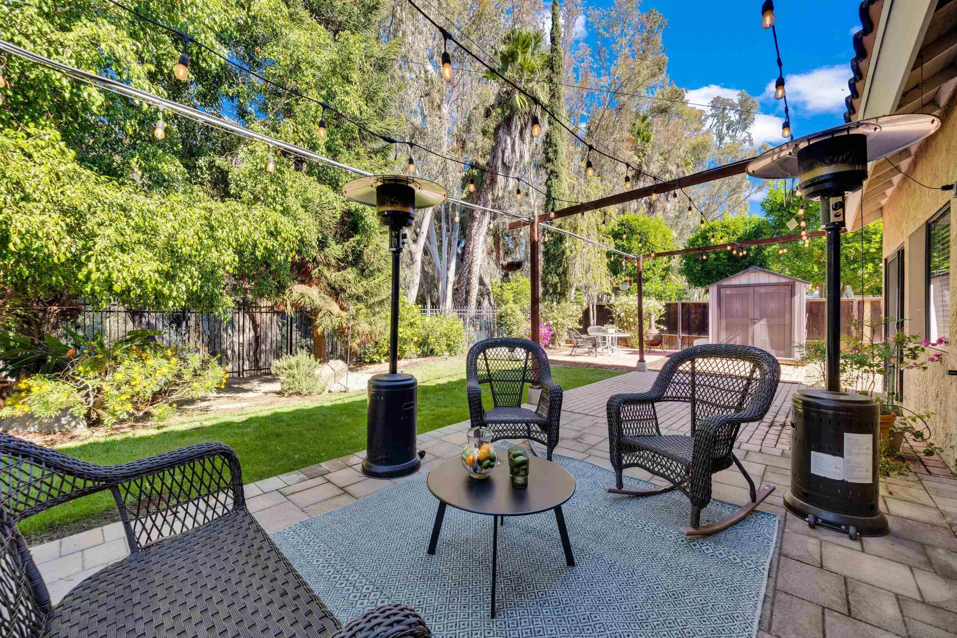 2010 Palsero Avenue Escondido, CA 92029 - Photo 45 of 58 a backyard of a house with barbeque oven table and chairs