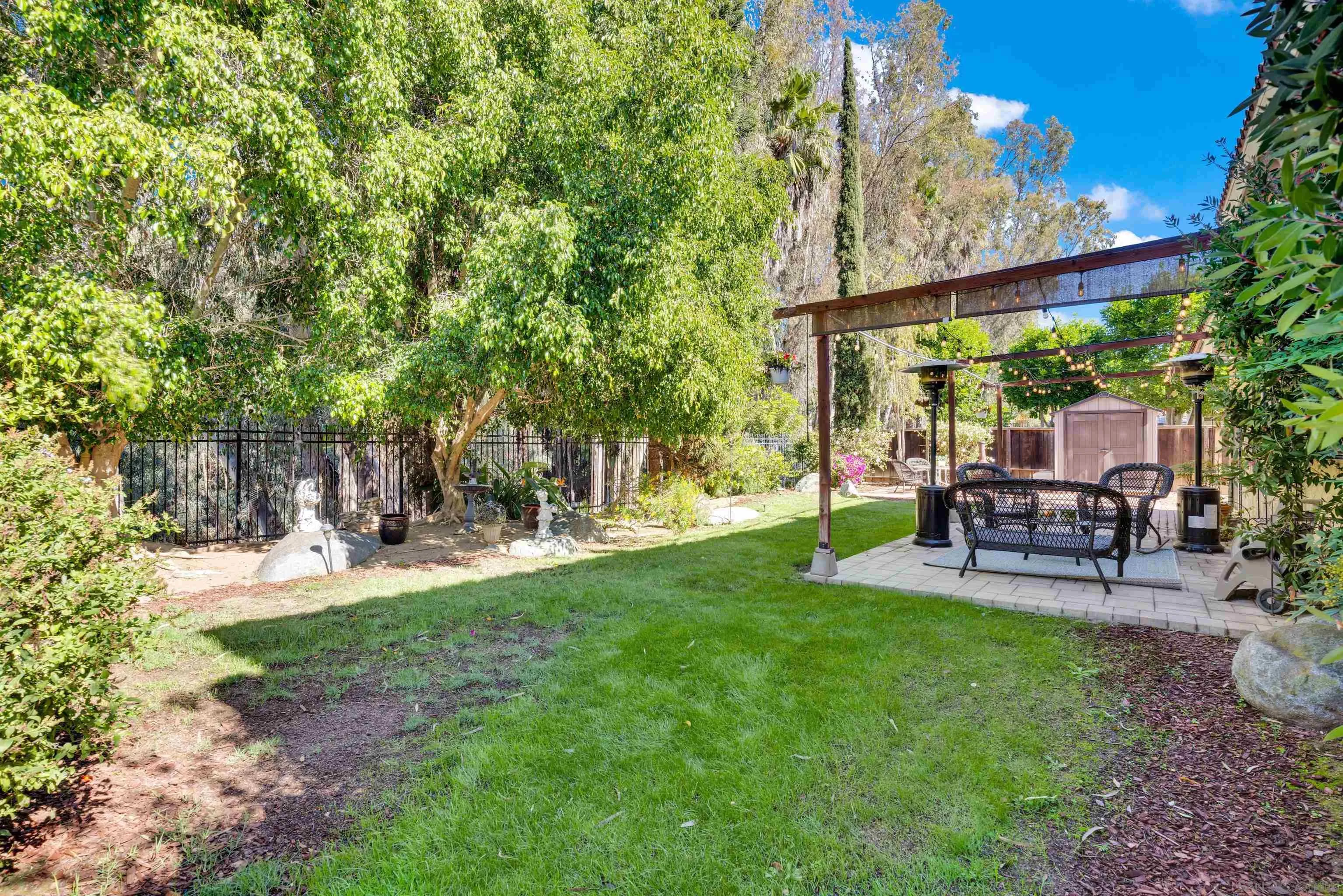 2010 Palsero Avenue Escondido, CA 92029 - Photo 49 of 58 a view of a table and chairs in the garden