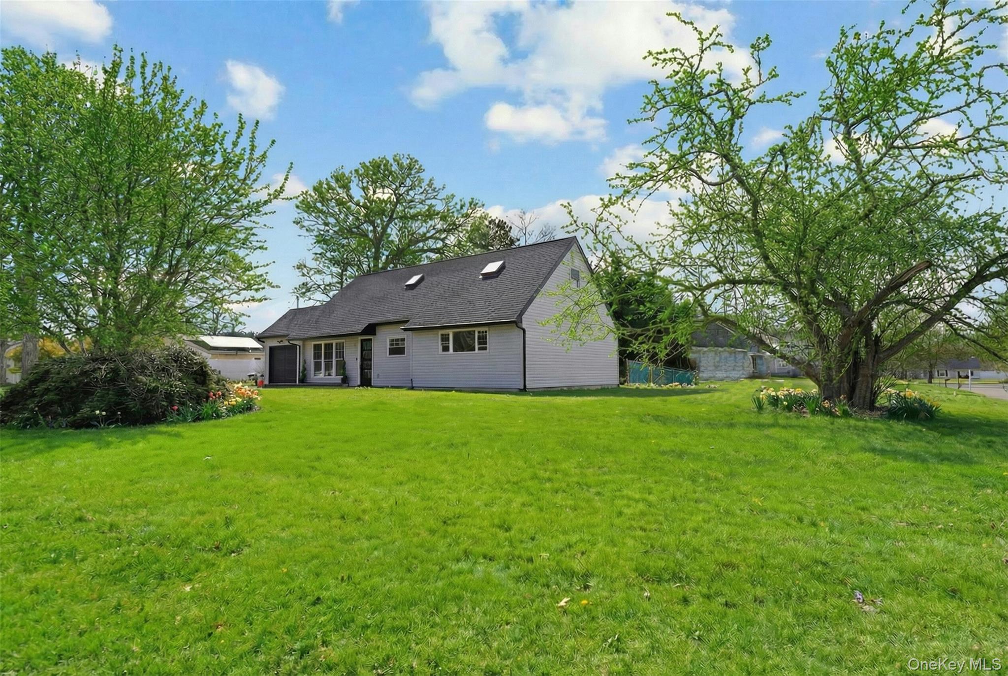 56 Pennaquid Road Coram, NY 11727 - Photo 3 of 35 Photo has been seasonally enhanced