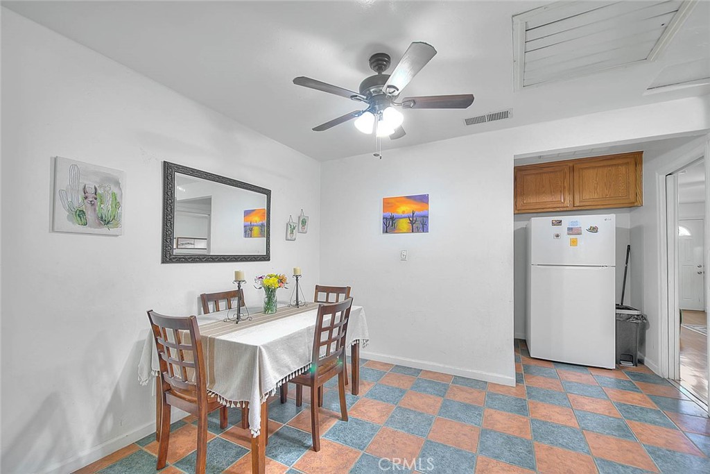 1042 Frontier Road Norco, CA 92860 - Photo 13 of 62 a view of a livingroom with furniture and a ceiling fan
