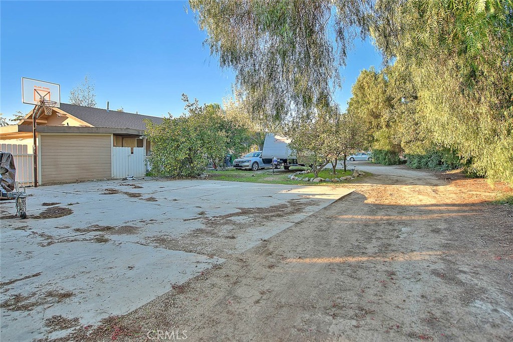 1042 Frontier Road Norco, CA 92860 - Photo 25 of 62 a view of a yard with a house