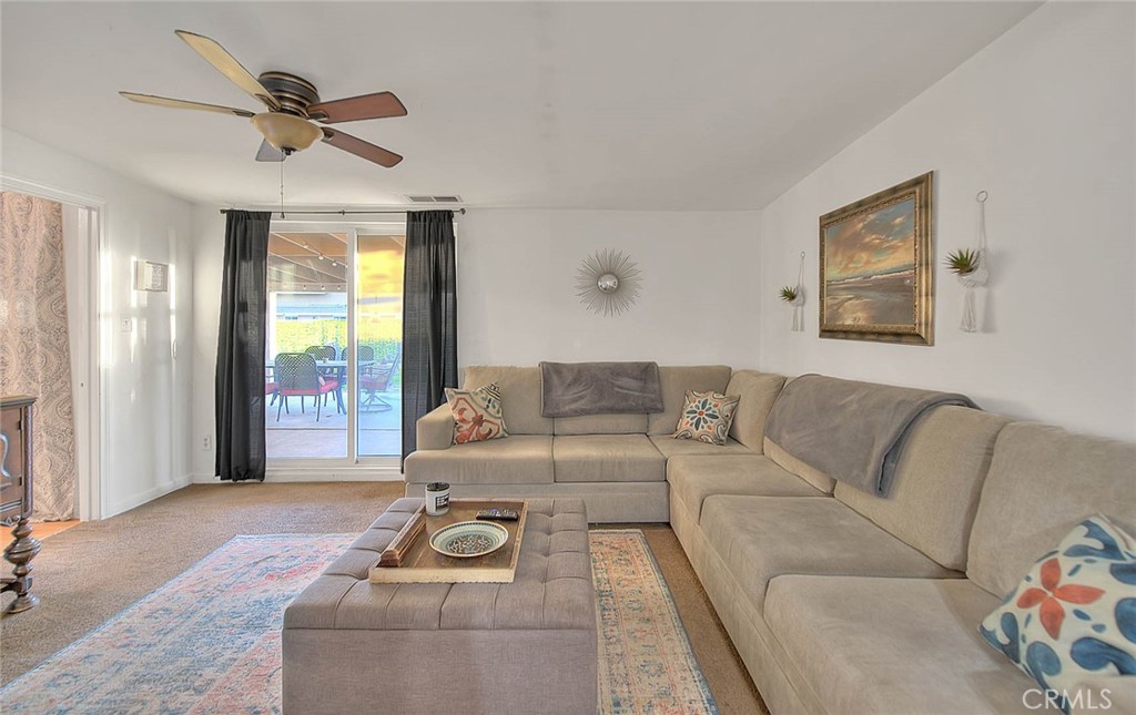 1042 Frontier Road Norco, CA 92860 - Photo 29 of 62 a living room with furniture and a large window