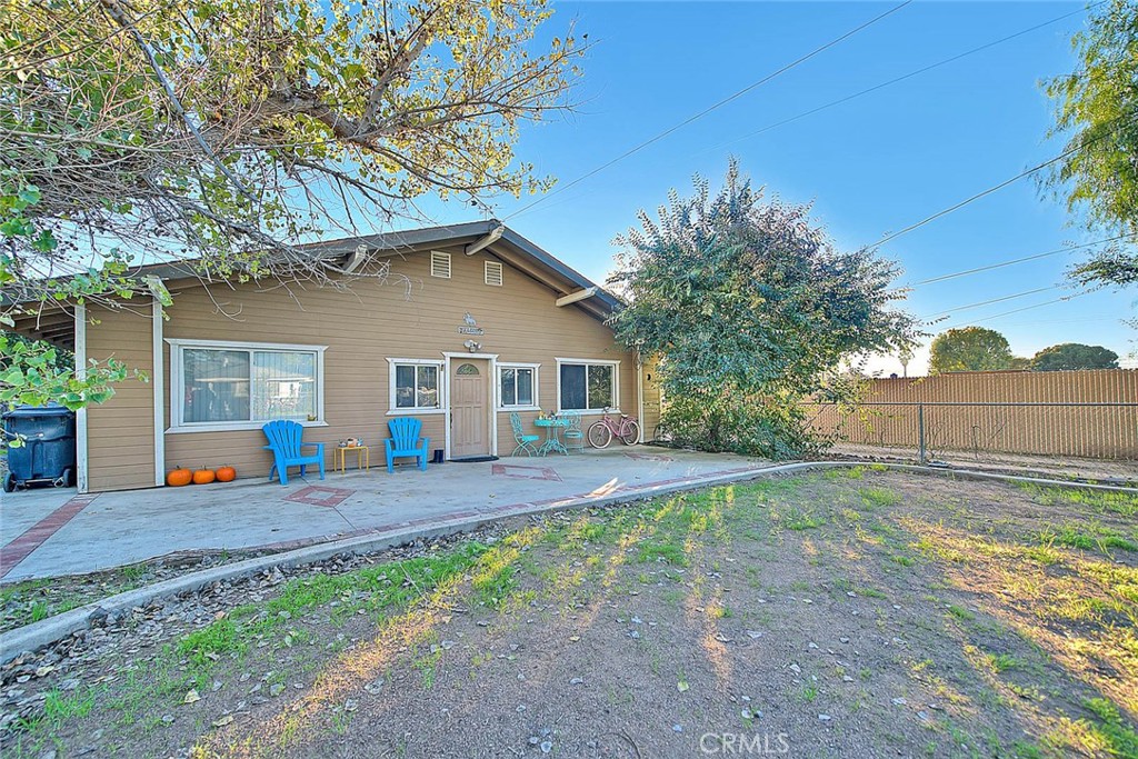 1042 Frontier Road Norco, CA 92860 - Photo 3 of 62 a front view of a house with a yard