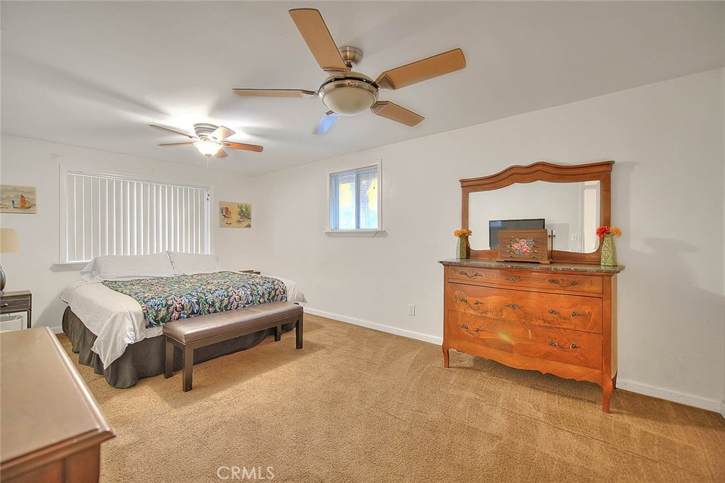 1042 Frontier Road Norco, CA 92860 - Photo 41 of 62 a living room with furniture and a ceiling fan