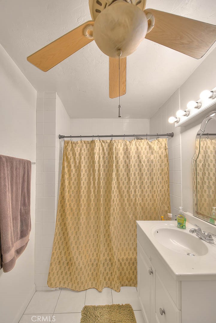 1042 Frontier Road Norco, CA 92860 - Photo 48 of 62 a bathroom with a sink and a mirror