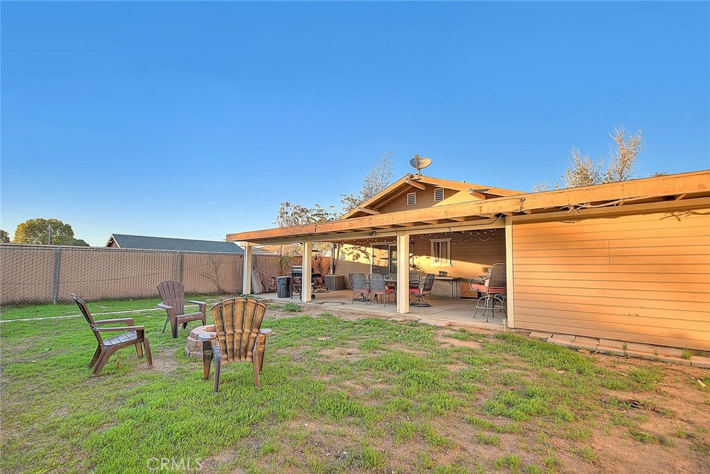 1042 Frontier Road Norco, CA 92860 - Photo 51 of 62 a view of a house with a yard and sitting area