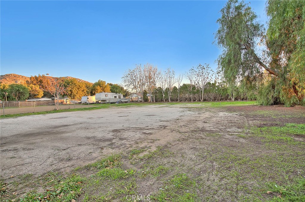 1042 Frontier Road Norco, CA 92860 - Photo 56 of 62 a view of a field with trees in background
