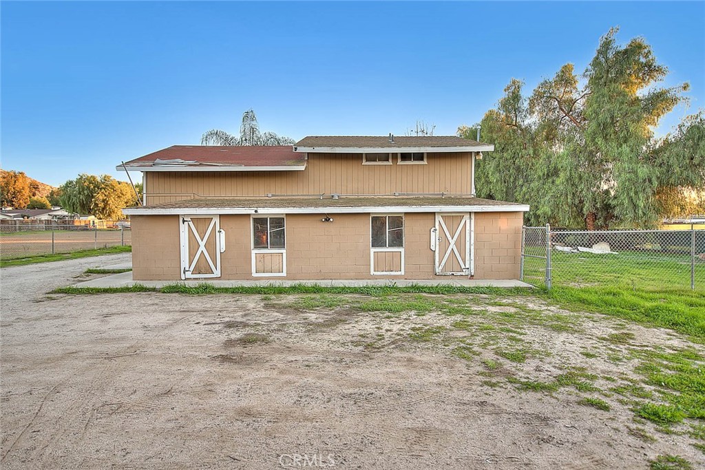 1042 Frontier Road Norco, CA 92860 - Photo 61 of 62 a view of a house with yard and a garden