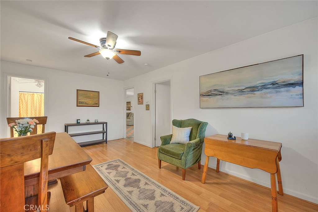 1042 Frontier Road Norco, CA 92860 - Photo 8 of 62 a living room with furniture and a chandelier