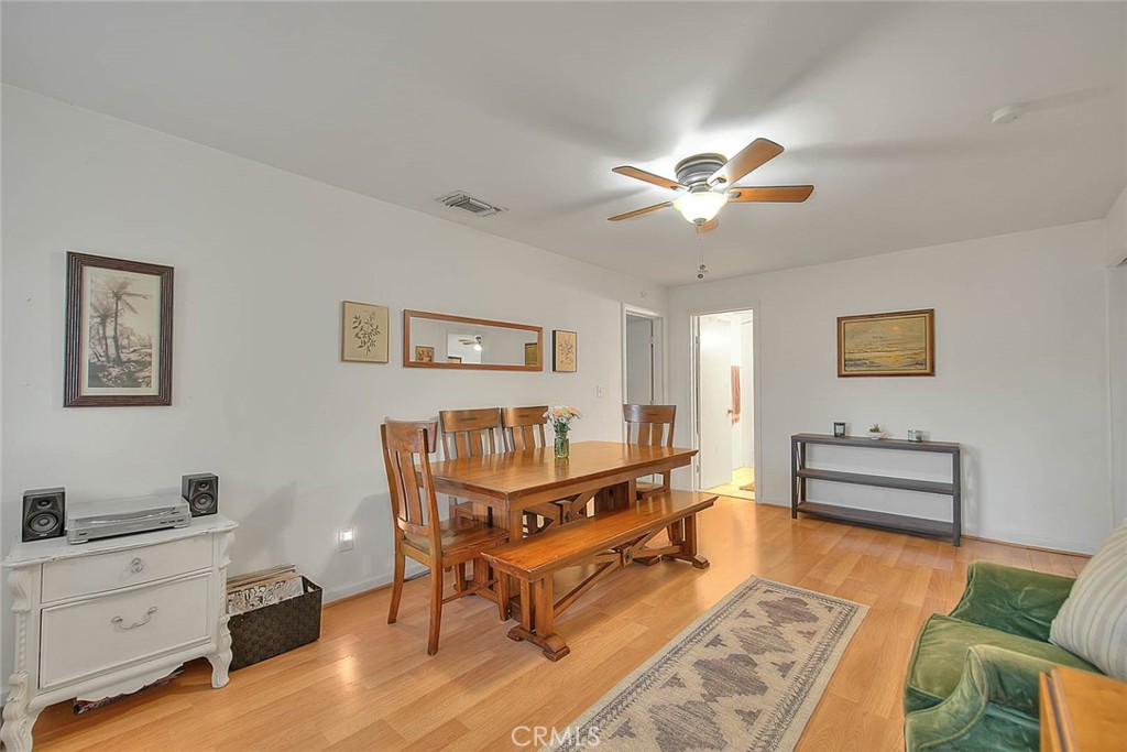 1042 Frontier Road Norco, CA 92860 - Photo 10 of 62 a living room with furniture and a dresser