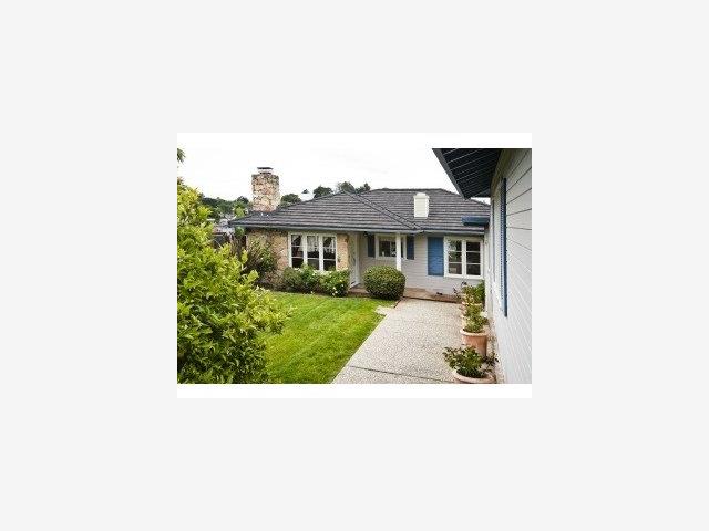 1516 Ridge Road Belmont, CA 94002 - Photo 3 of 9 a picture of a person on a street