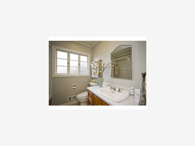 1516 Ridge Road Belmont, CA 94002 - Photo 7 of 9 a picture of a room with a window and mirror