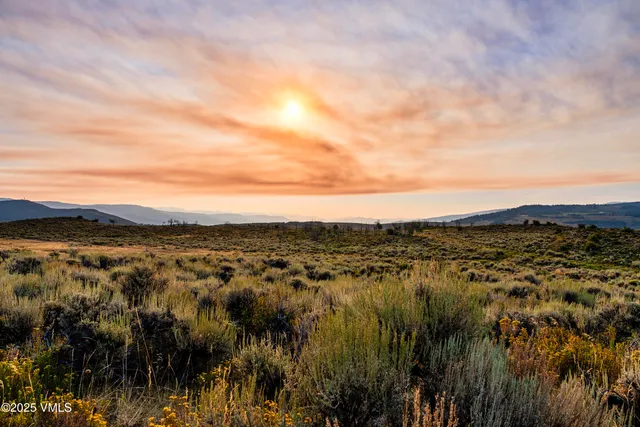 a view of mountain view with lots of bushes