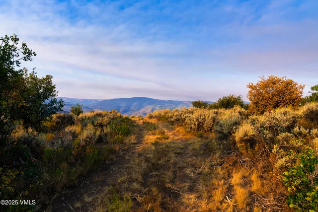 a view of lake and mountain