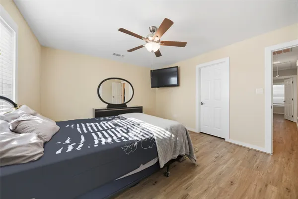 a bathroom with a granite countertop sink mirror and double