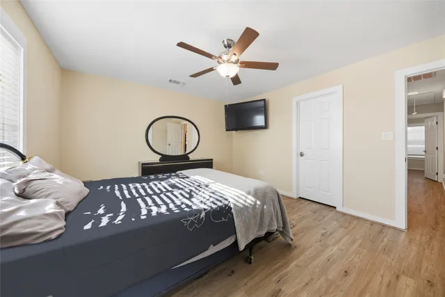 a bathroom with a granite countertop sink mirror and double