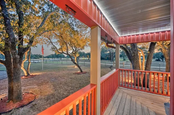 a view of a porch with a yard