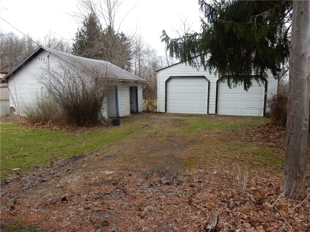 517 Mt Jackson Road New Castle, PA 16102 - Photo 3 of 16 Double garage with auto door opener and large shed