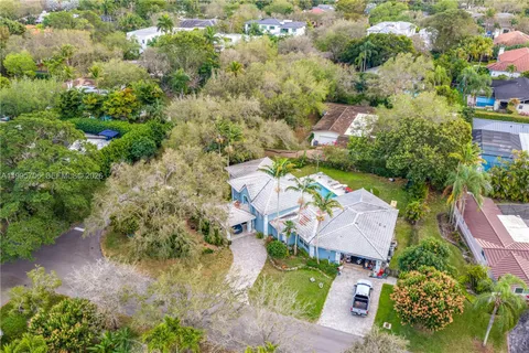 an aerial view of house with yard