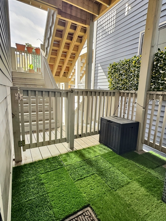 187 London Street, Unit 1 Boston, MA 02128 - Photo 23 of 26 front view of a house with a yard