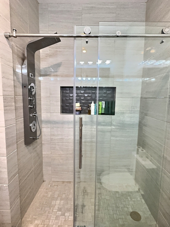 187 London Street, Unit 1 Boston, MA 02128 - Photo 10 of 26 a bathroom with a shower