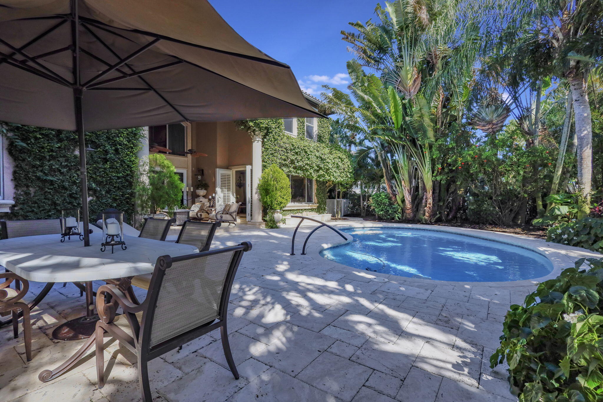 331 Eagle Drive Jupiter, FL 33477 - Photo 43 of 51 Patio & Pool Area