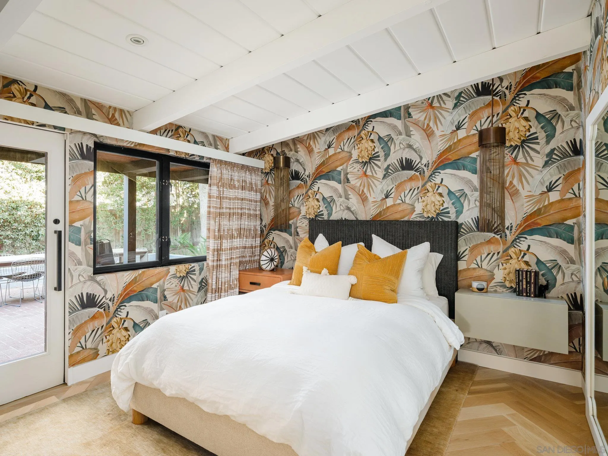 462 15th Street Del Mar, CA 92014 - Photo 25 of 35 a bedroom with a bed and wooden floor