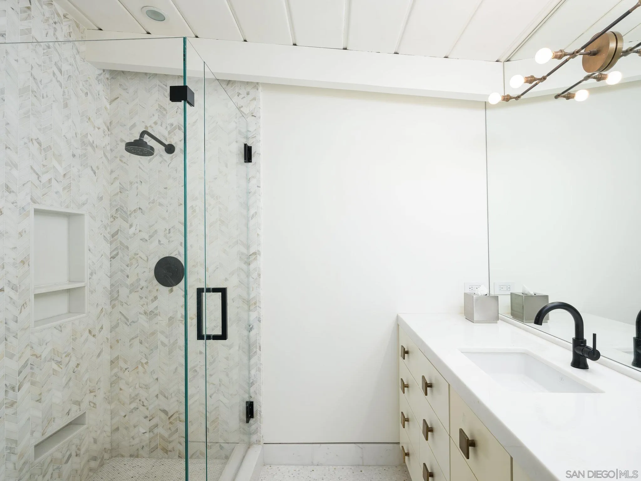462 15th Street Del Mar, CA 92014 - Photo 27 of 35 a bathroom with a sink and a mirror