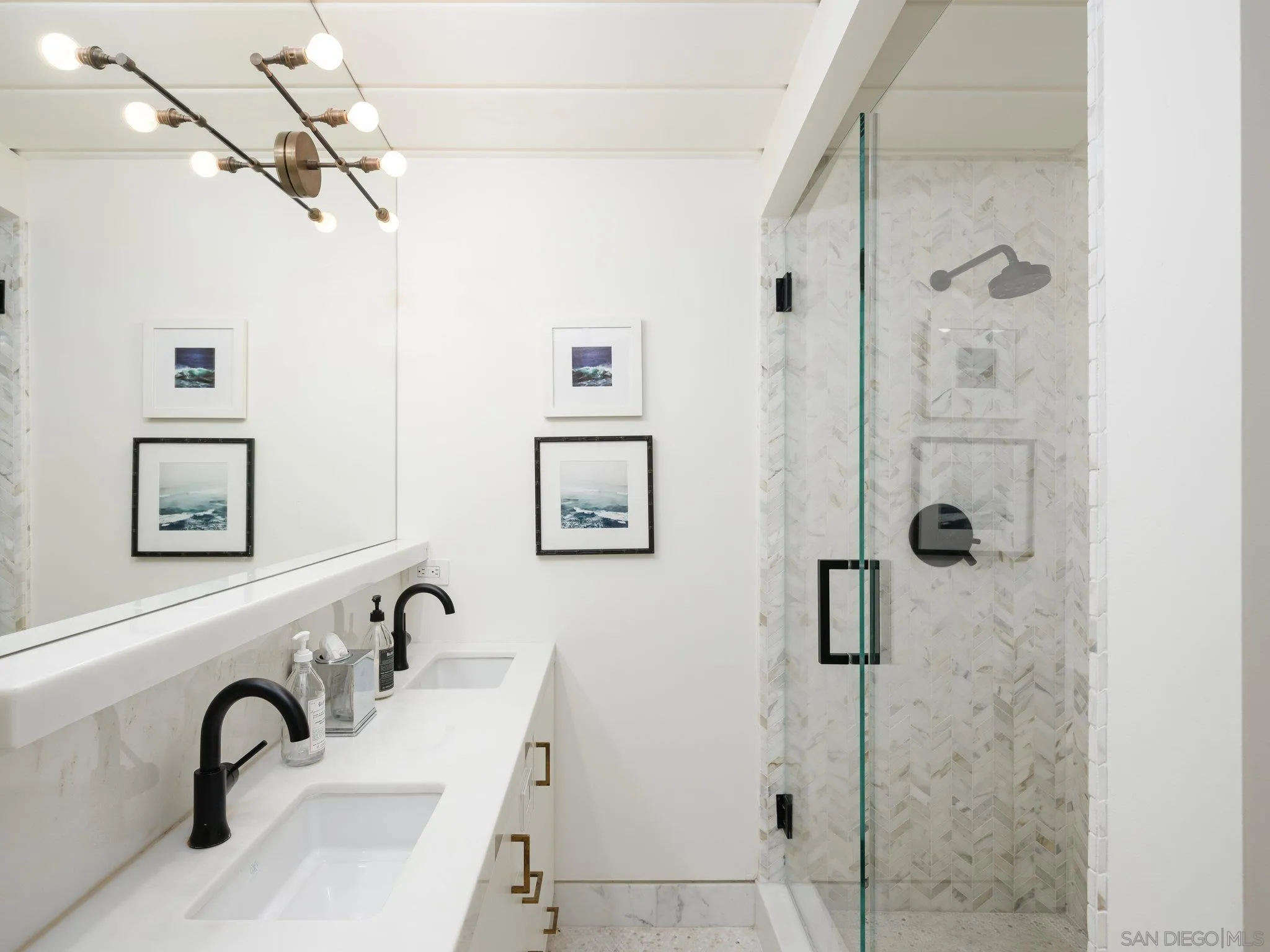 462 15th Street Del Mar, CA 92014 - Photo 28 of 35 a bathroom with a sink and mirror