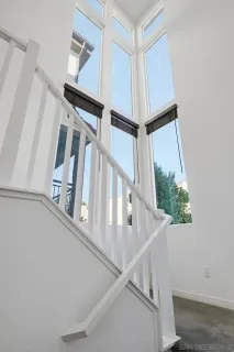 a kitchen with a sink and refrigerator
